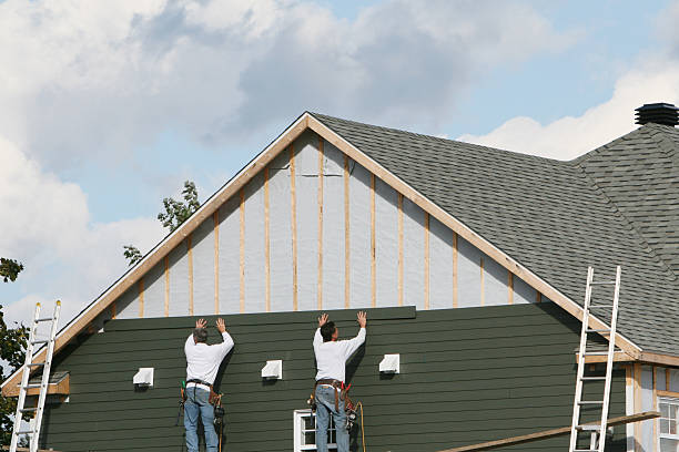Professional Storm Damage Siding Repair technician working in Markleysburg, PA